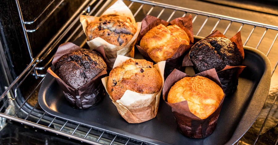 Fresh-baked high-protein muffins cooling on a wire rack